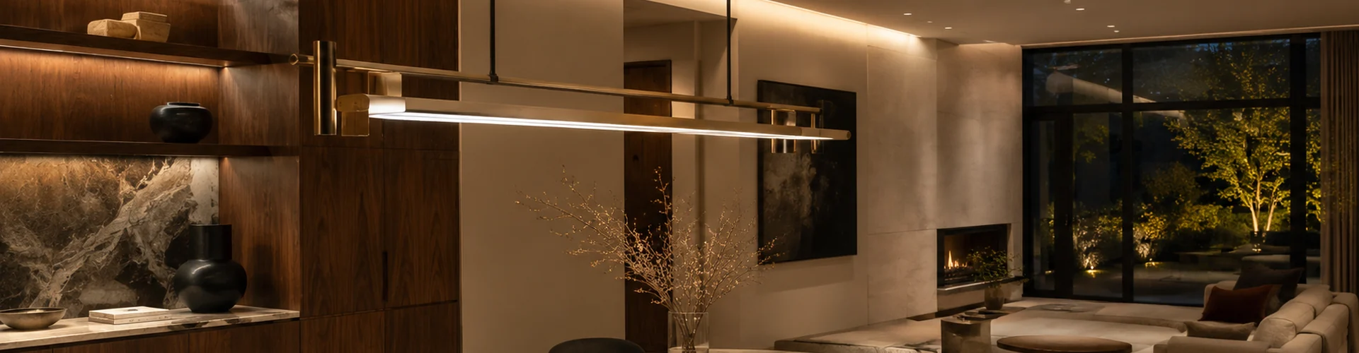 Room after a warm linear pendant is turned on