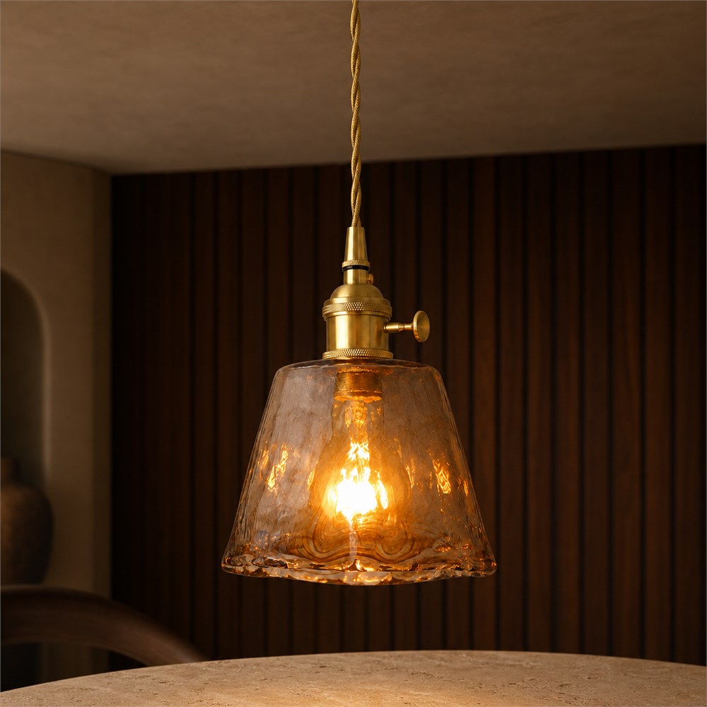 Brass and amber glass pendant in a travertine setting
