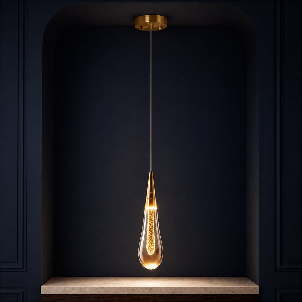 Crystal drop pendant in a midnight navy studio