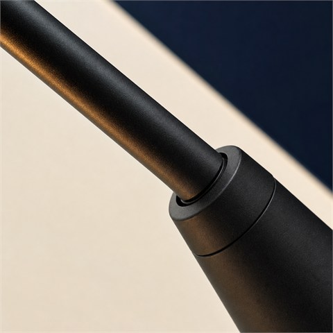 Macro detail of matte blackened metal