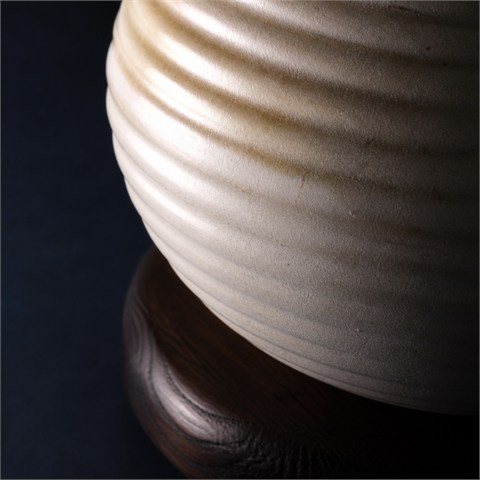 Macro detail of a ribbed tonal ceramic glaze