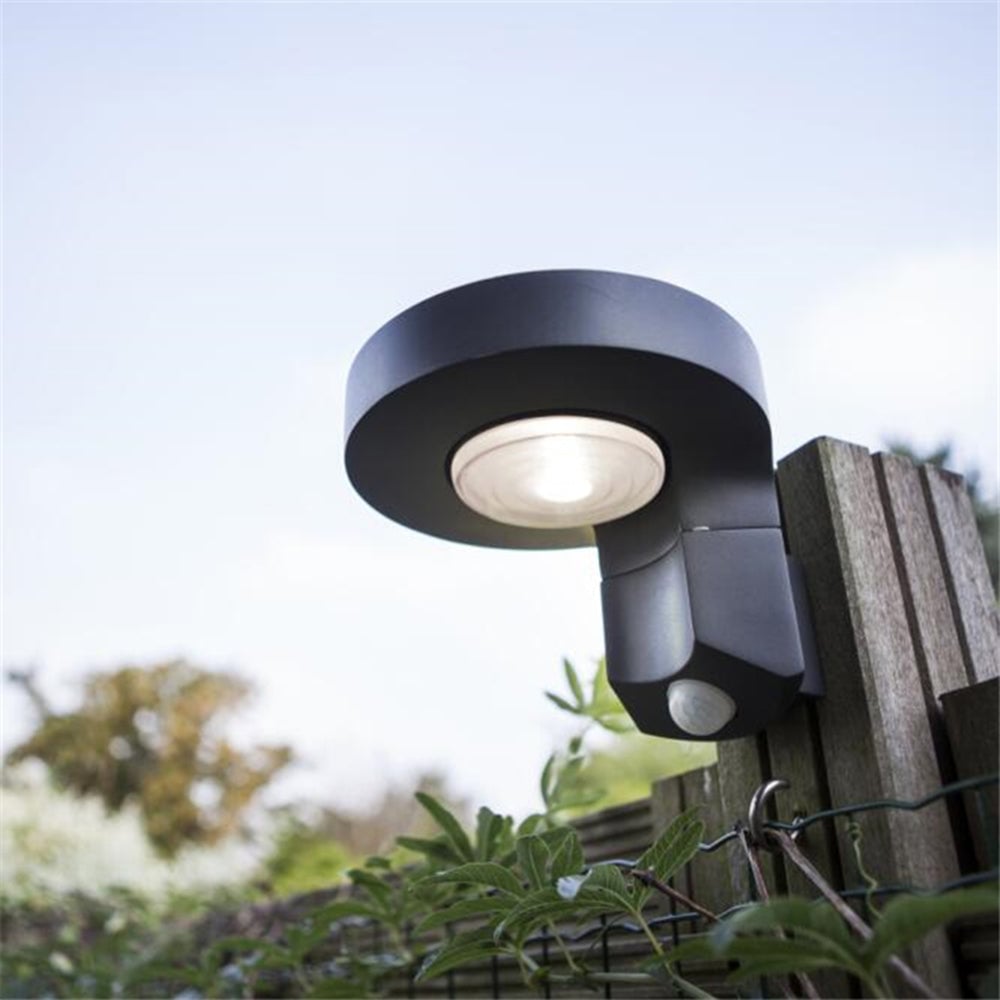 Orr Modern Round Metal/Acrylic Sensor Solar Waterproof Outdoor Wall Lamp, Black - Lumpaz