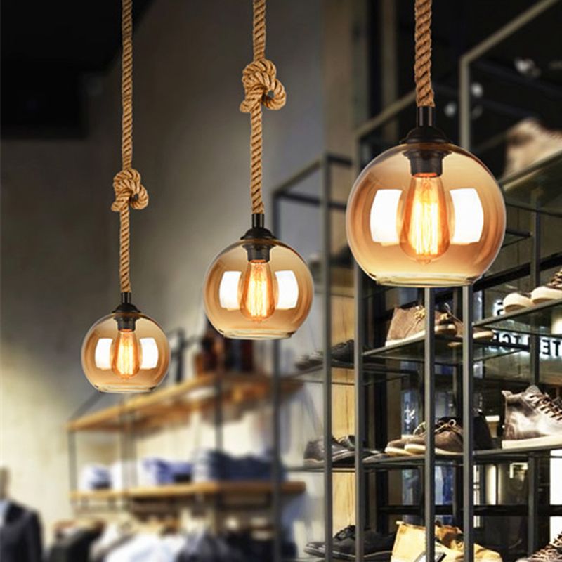 Hailie Vintage Industrial Ball Glass Pendant Light, Clear/Amber - Lumpaz