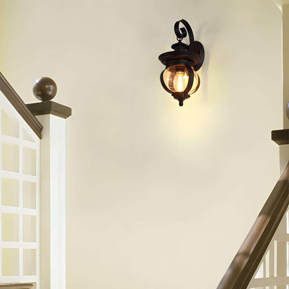 1-Light Seeded Glass Globe LED Outdoor Wall Lantern with Curved Arm - Lumpaz