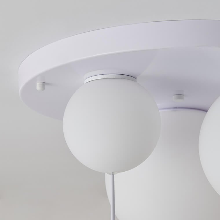Frosted glass globe and ceiling plate detail