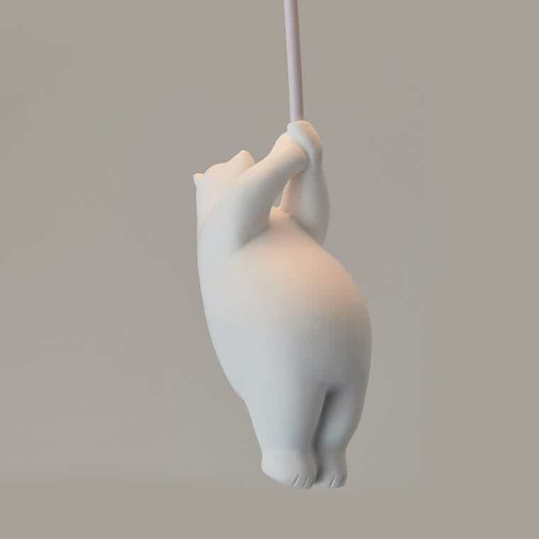 Rear view of a suspended bear figure