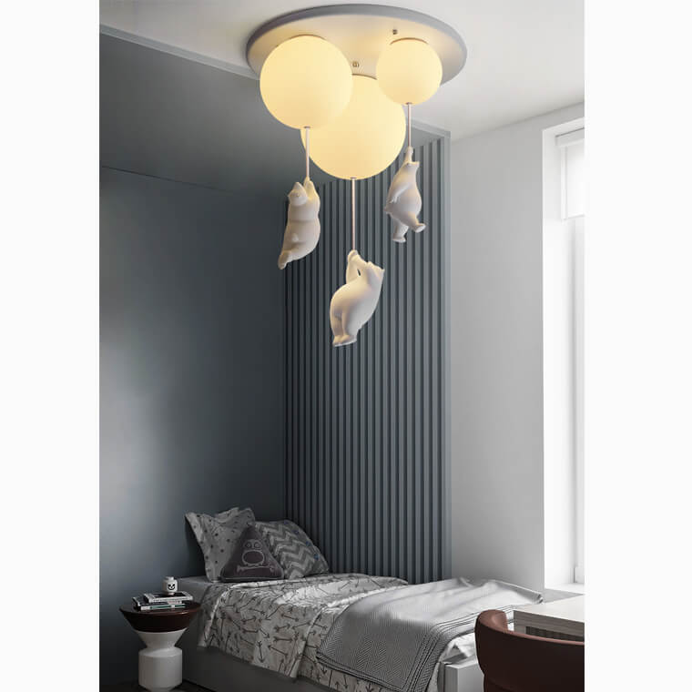 Bear ceiling light above a children’s bed