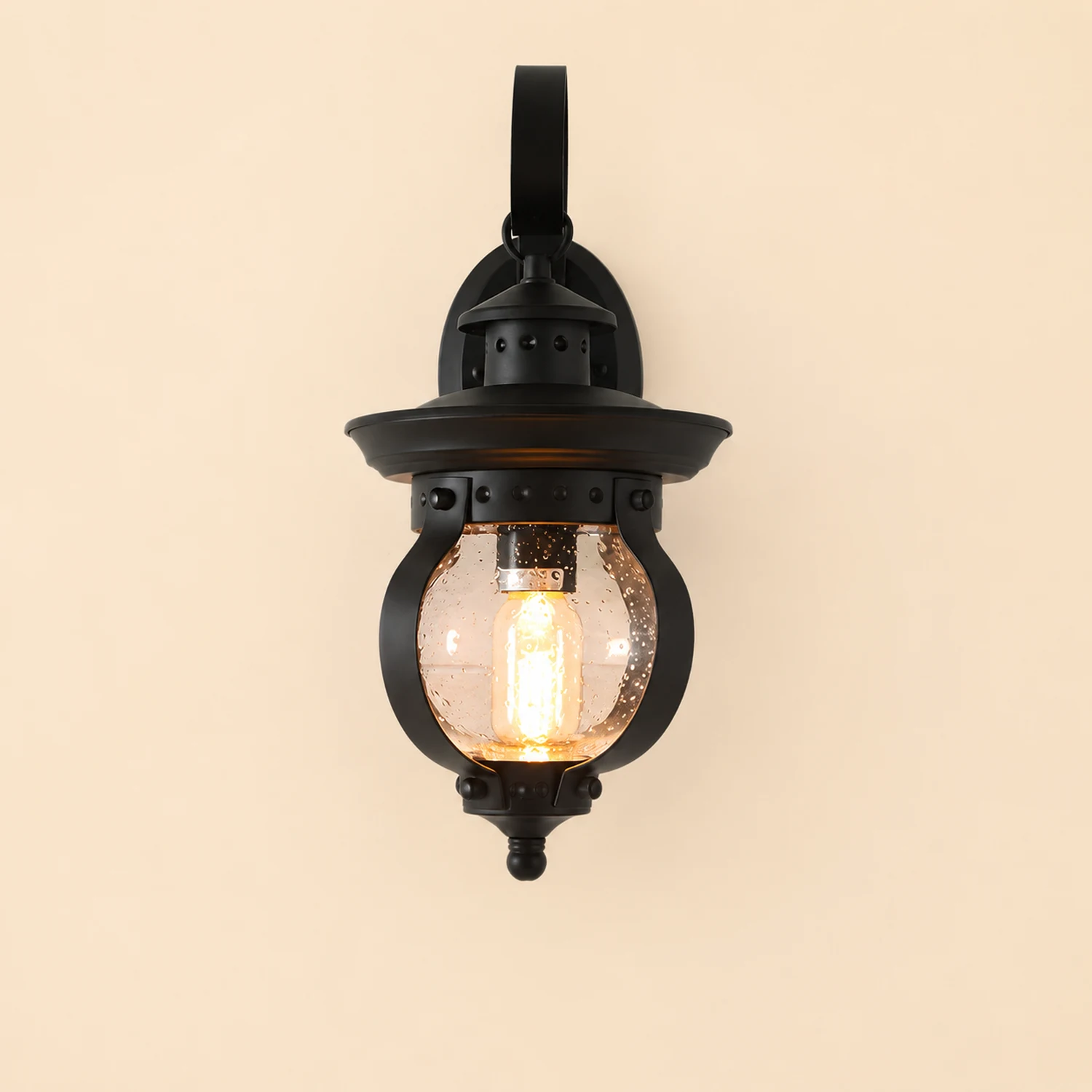 1-Light Seeded Glass Globe LED Outdoor Wall Lantern with Curved Arm - Lumpaz