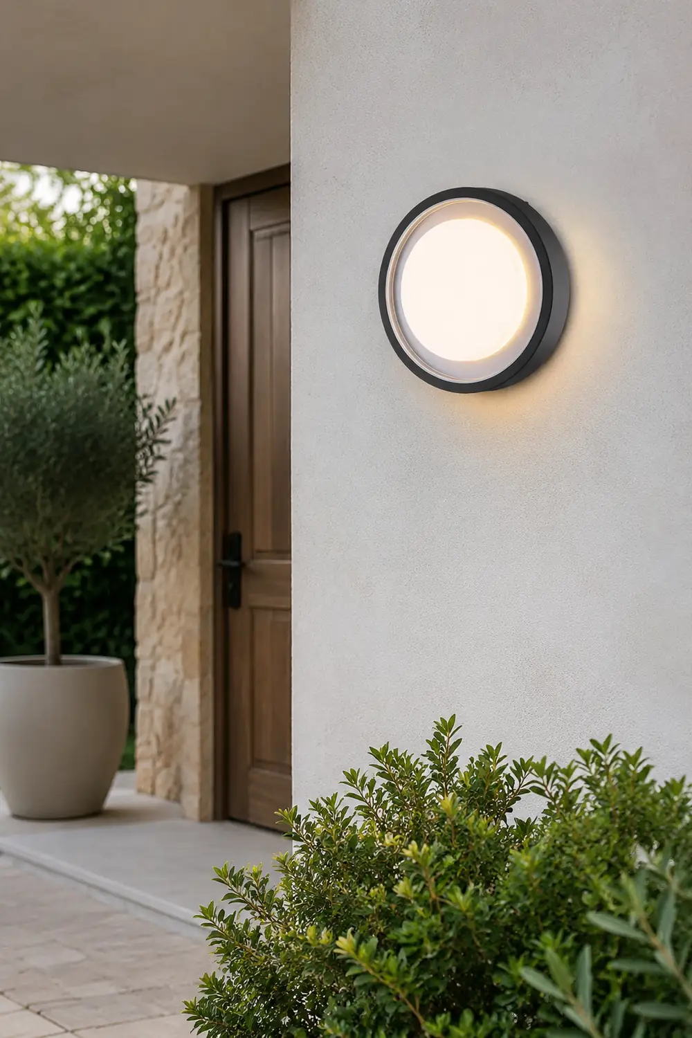 Orr Modern Circular Disc Shape Metal Outdoor Wall Lamp, Black - Lumpaz