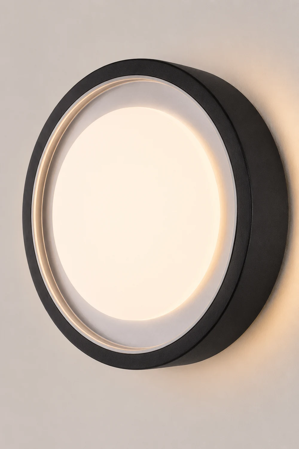 Orr Modern Circular Disc Shape Metal Outdoor Wall Lamp, Black - Lumpaz