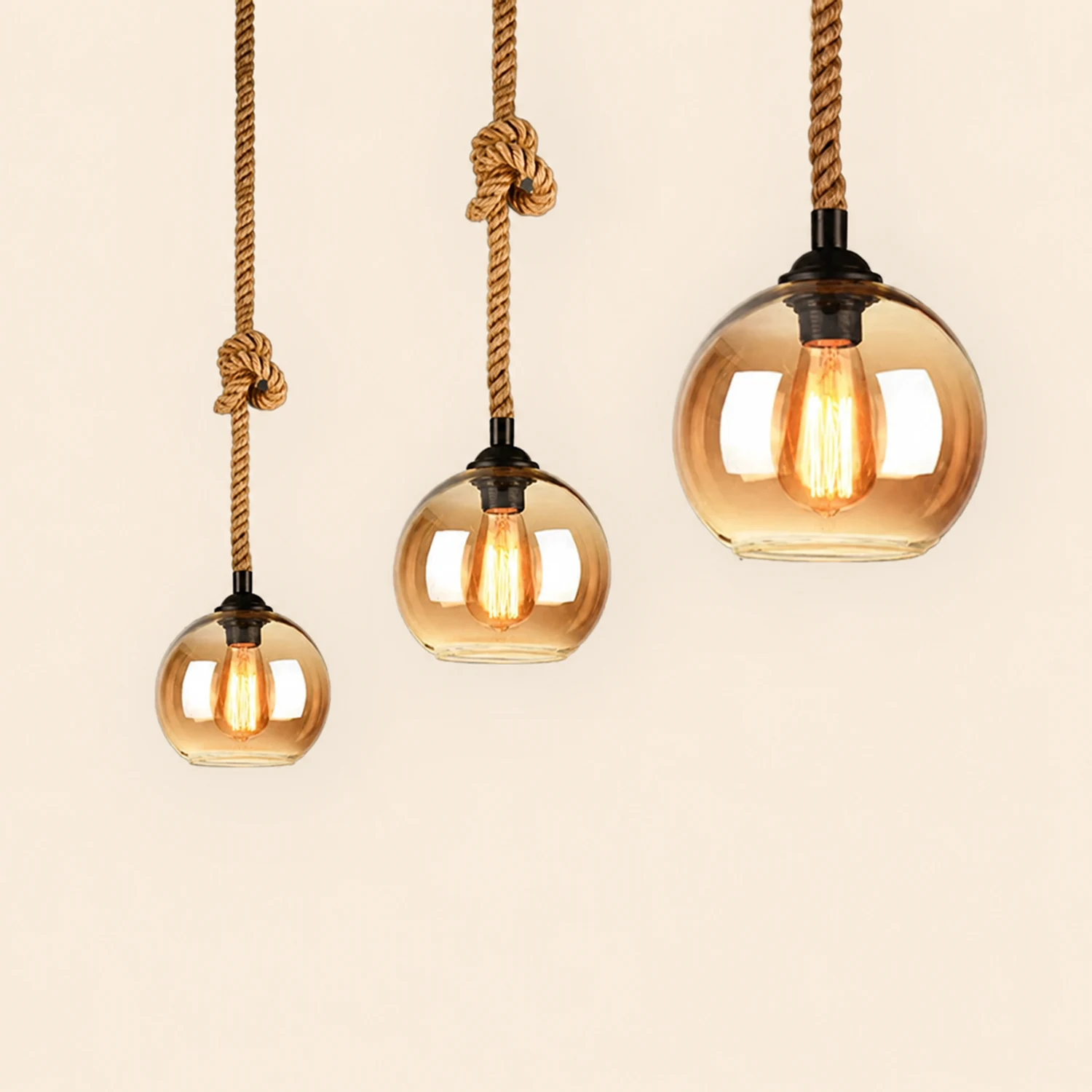 Hailie Vintage Industrial Ball Glass Pendant Light, Clear/Amber - Lumpaz