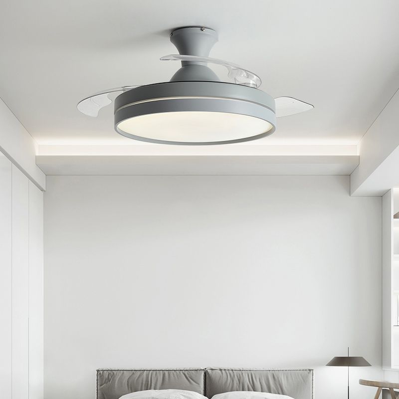 Gray Morandi circular fan light in a pale room