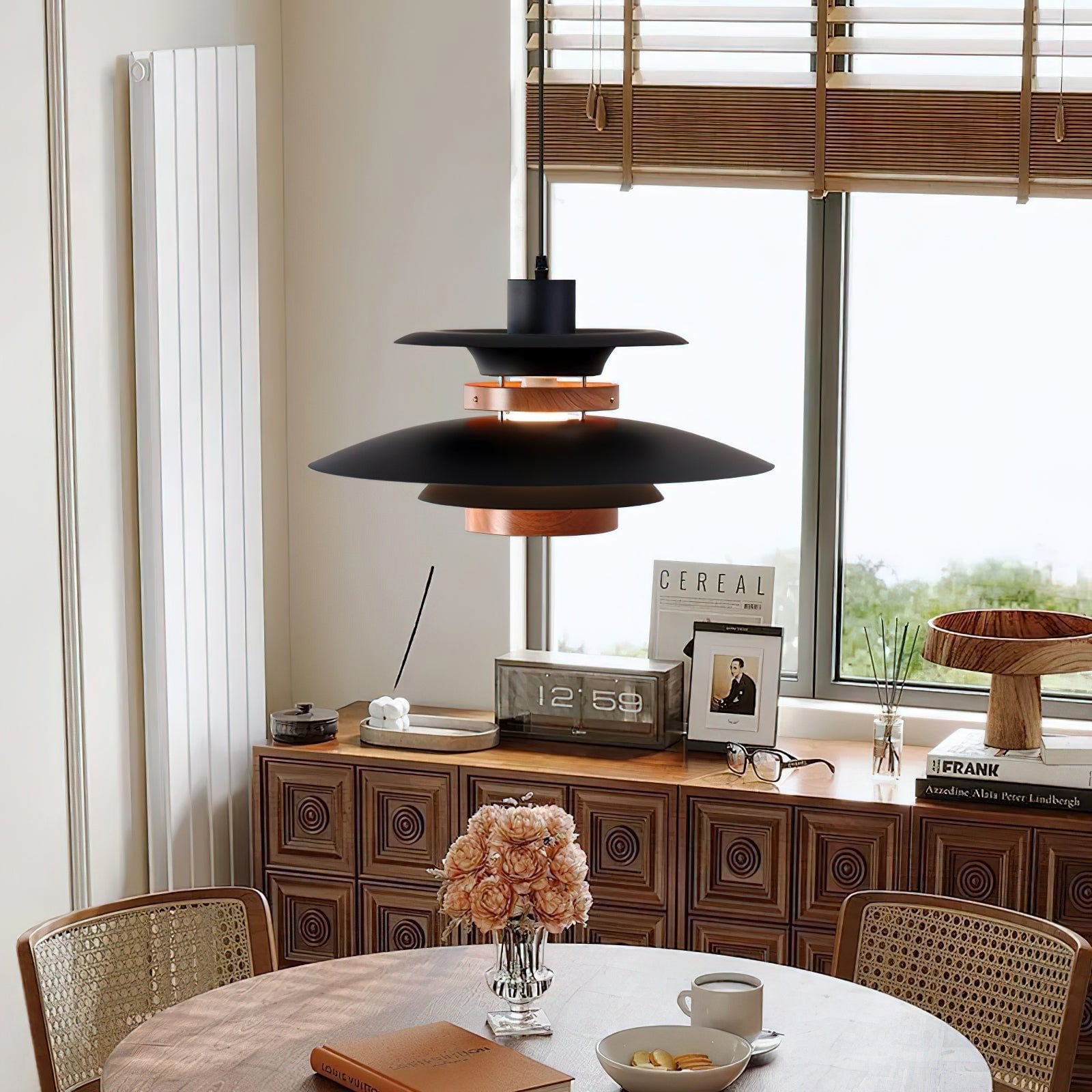 Close-up of the black Mercero layered shade beside a window