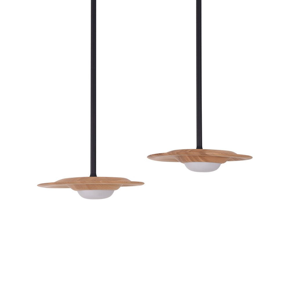 Two light wood-grain disc shades on black rods against white, showing the white domed diffusers without a bright glow