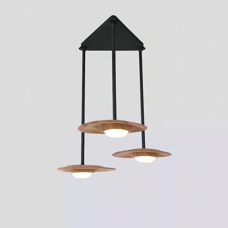 Three light wood-grain pendant heads on staggered black rods from a triangular black canopy, with white diffusers