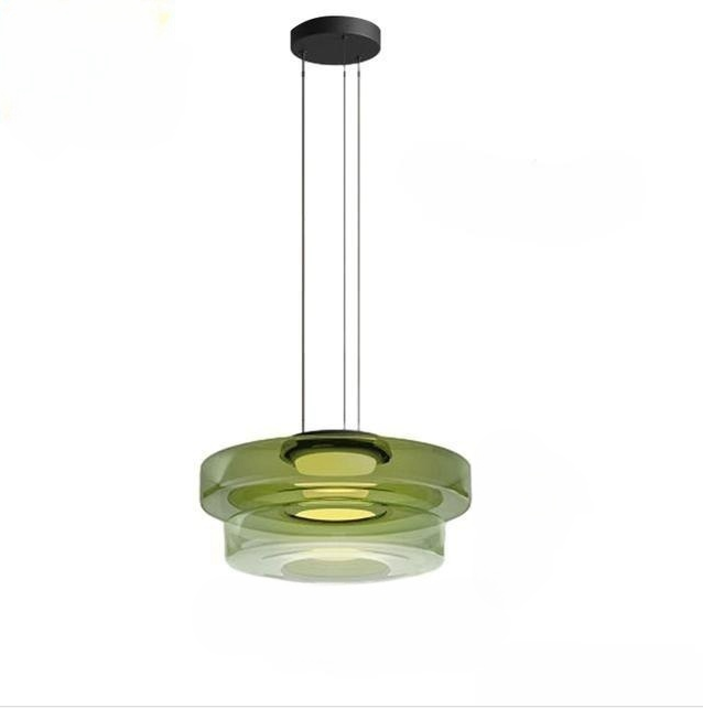 Green double-tier glass pendant with a black round ceiling canopy, isolated on white