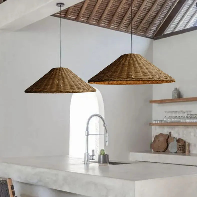 Two Brown cone pendants with separate ceiling connections above an island beneath a pitched timber ceiling