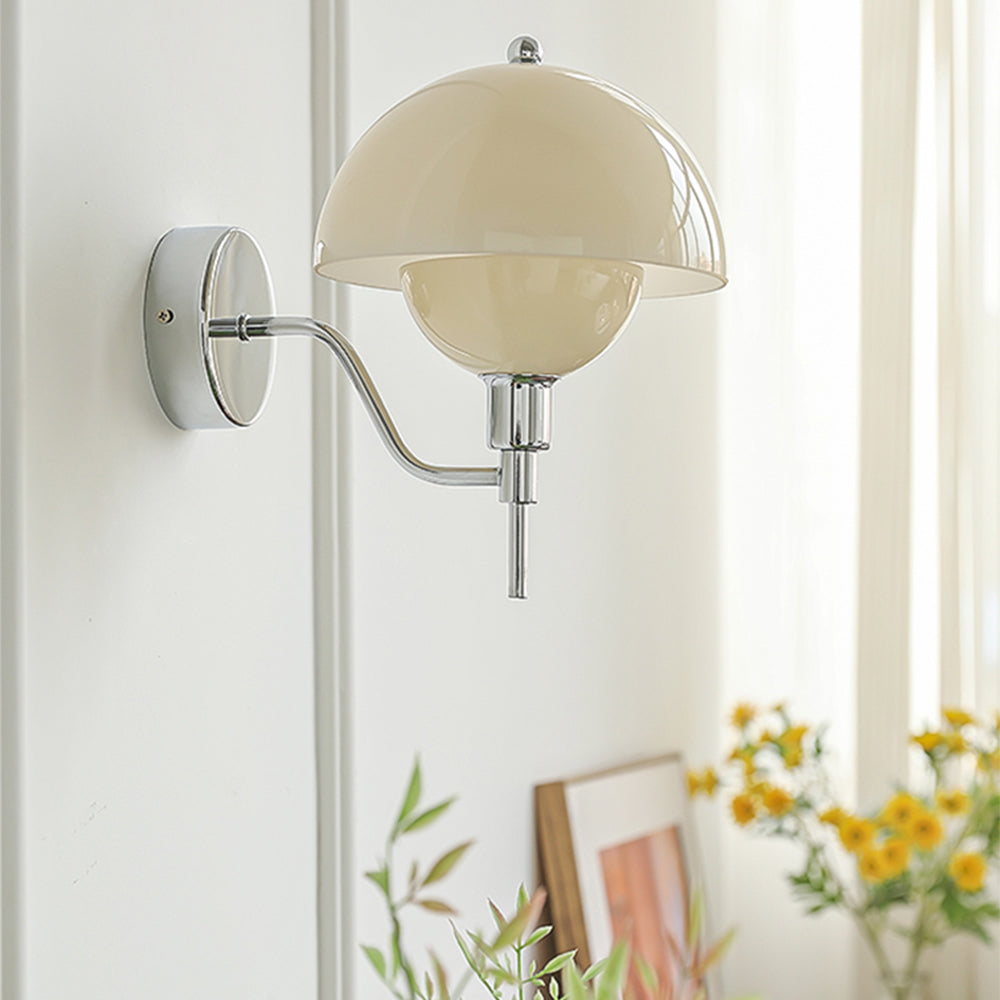 Unlit Beige mushroom glass shade on a Chrome wall arm