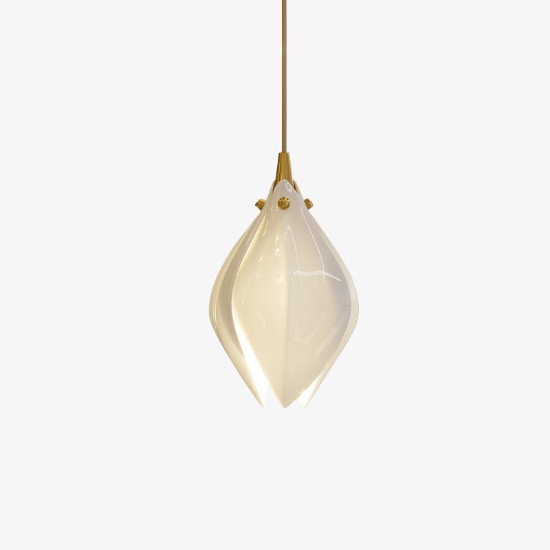 Single glowing white flower bud with gold-tone fittings against white