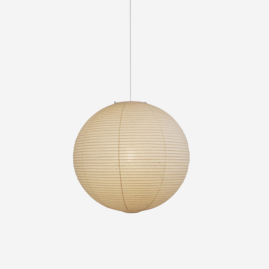 Glowing White paper globe on a white background showing ribs, curved joins and hanging cord