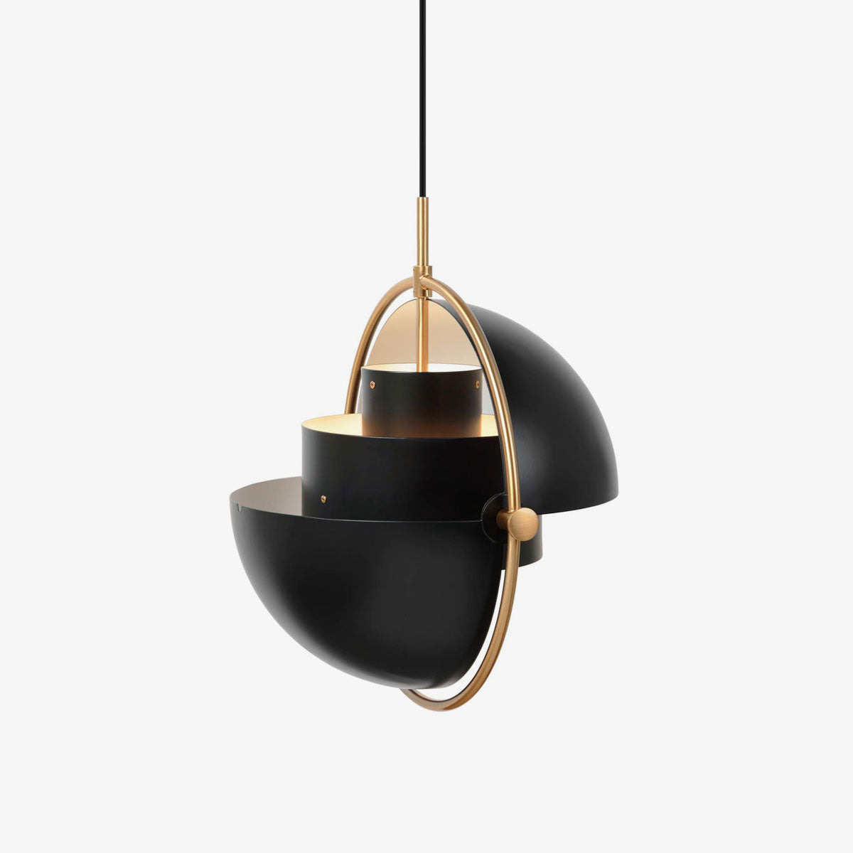 Black shade halves rotated in opposite directions within a gold-toned ring.