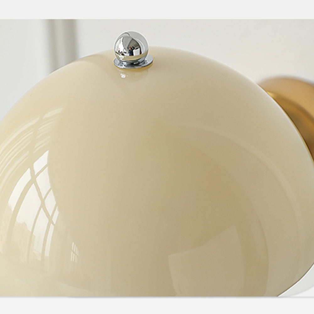 Close-up of glossy Beige glass dome and small top finial