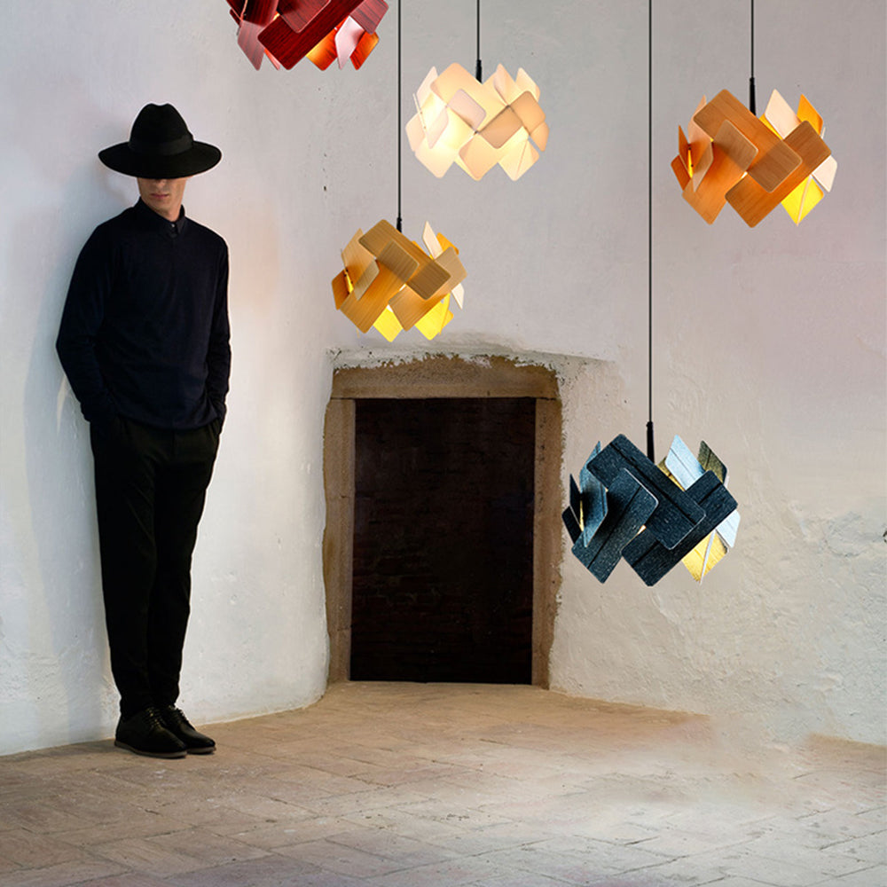Escape gallery display with geometric pendants in several colours