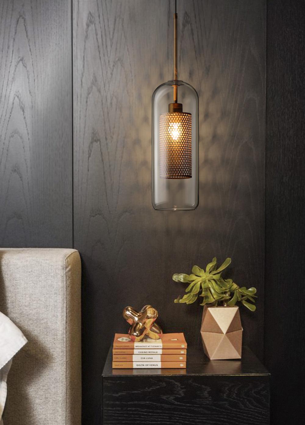 Single Capsule pendant beside a chair and side table