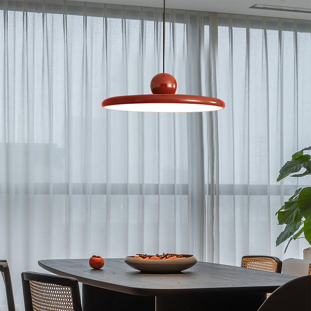 Lola red disc pendant above a dark dining table
