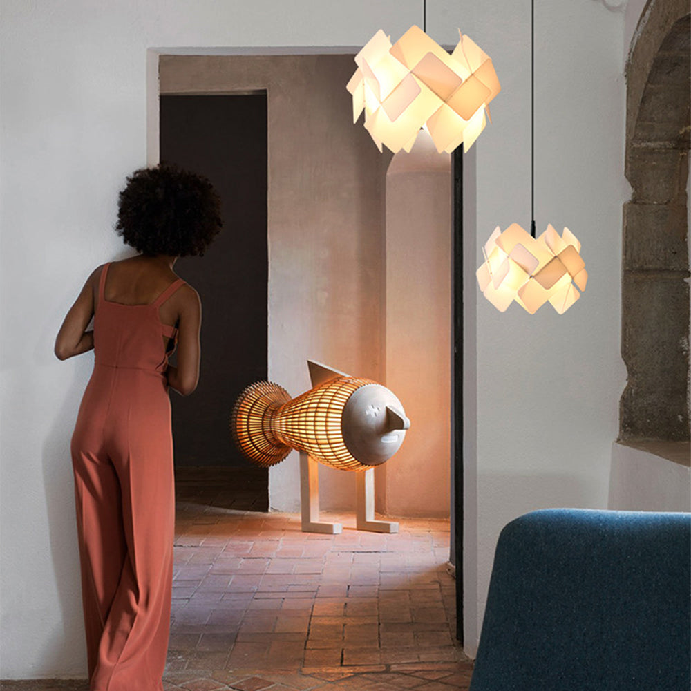 Escape gallery scene with two white geometric pendants in different sizes
