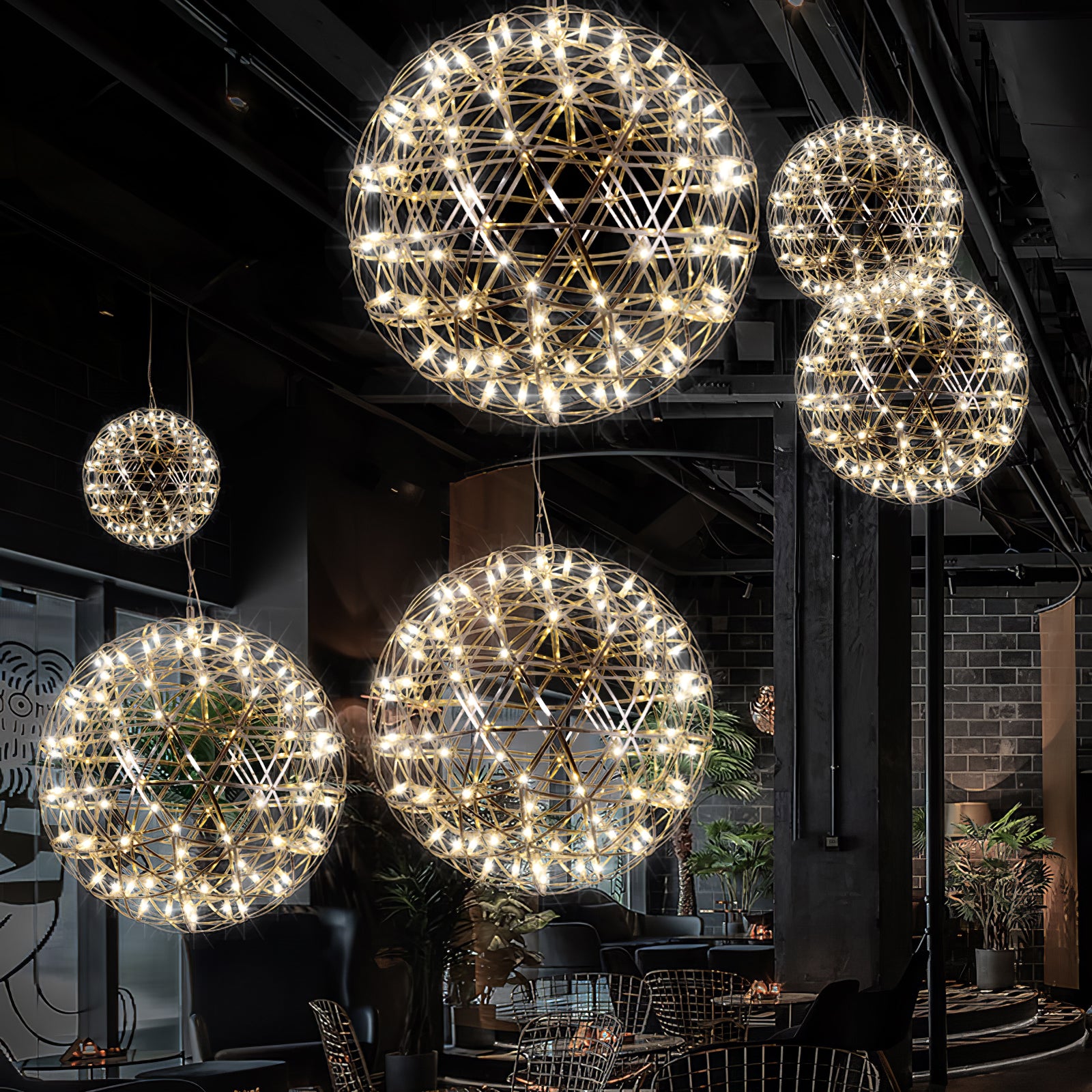 Glowing lattice pendants above restaurant tables beneath exposed beams and greenery
