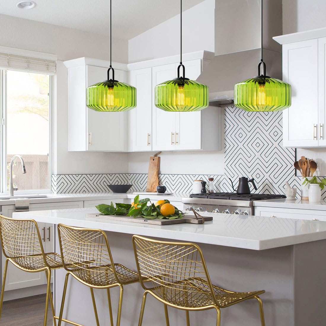 Three green pendants above a kitchen island