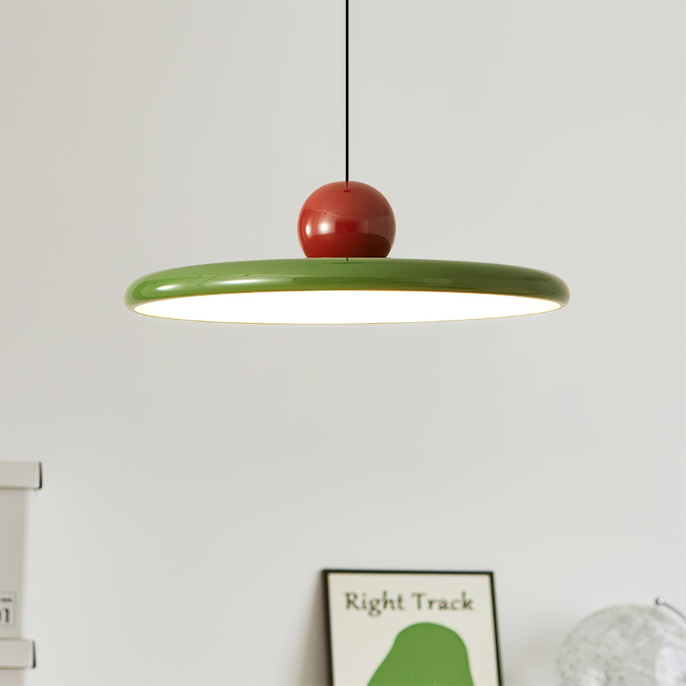 Lola green pendant near a framed wall print
