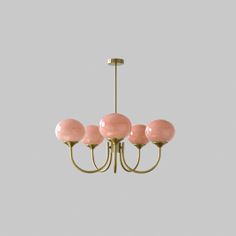 Five pink globe chandelier with gold-tone arms, a straight rod and circular canopy on a plain background