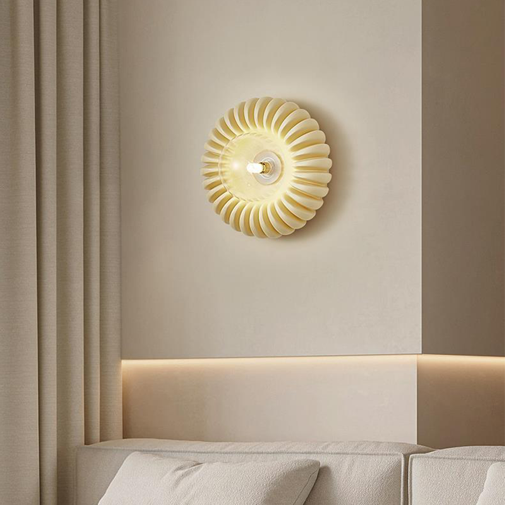 Clear shade option with transparent centre dish, visible lit bulb and beige fluted surround above a sofa