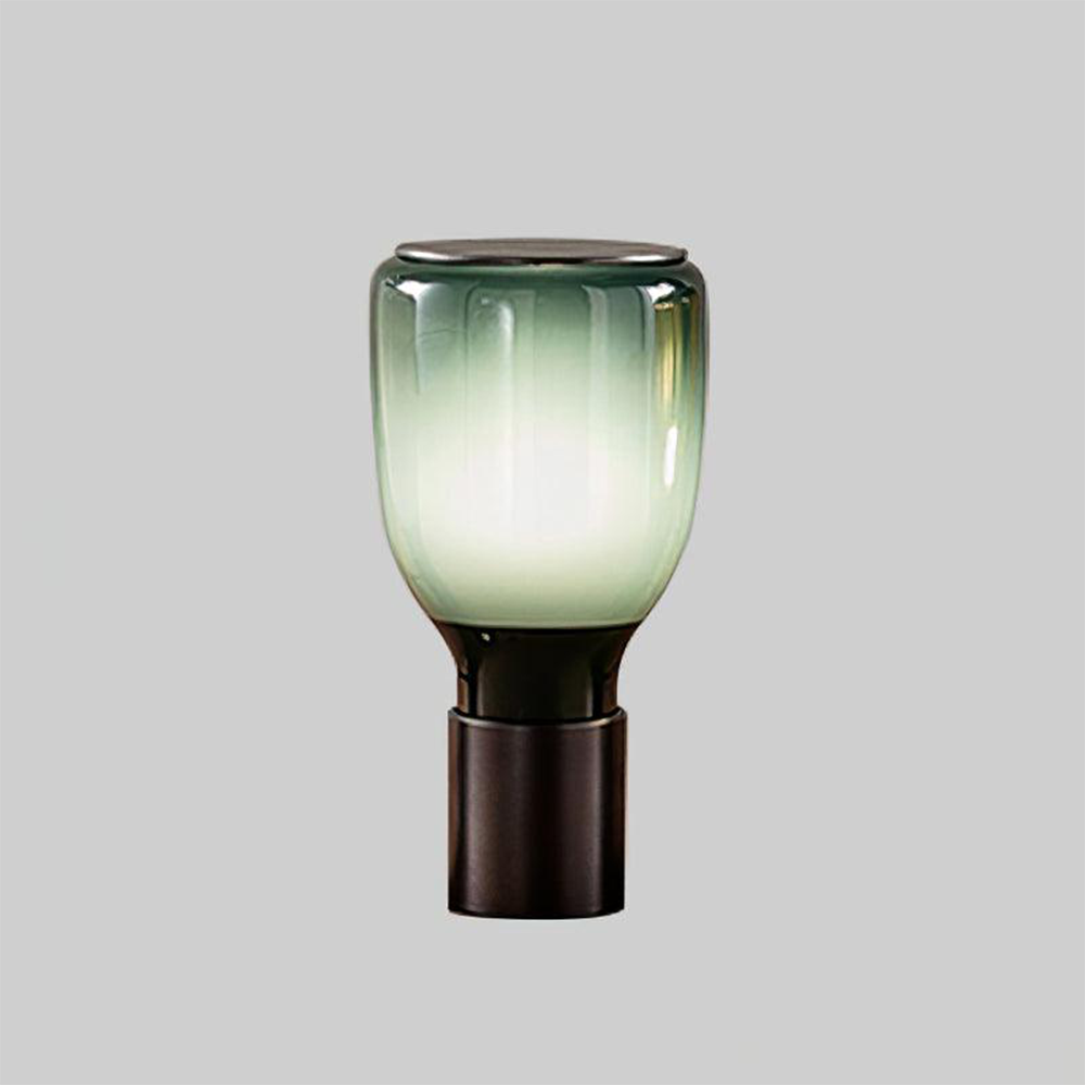 Gradient Green bottle-shaped lamp with green upper glass fading into a pale centre above a black base