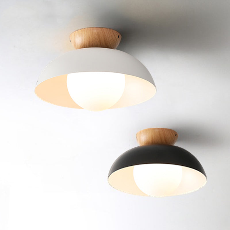 White and Black close-mount dome ceiling lights with wood accents shown together