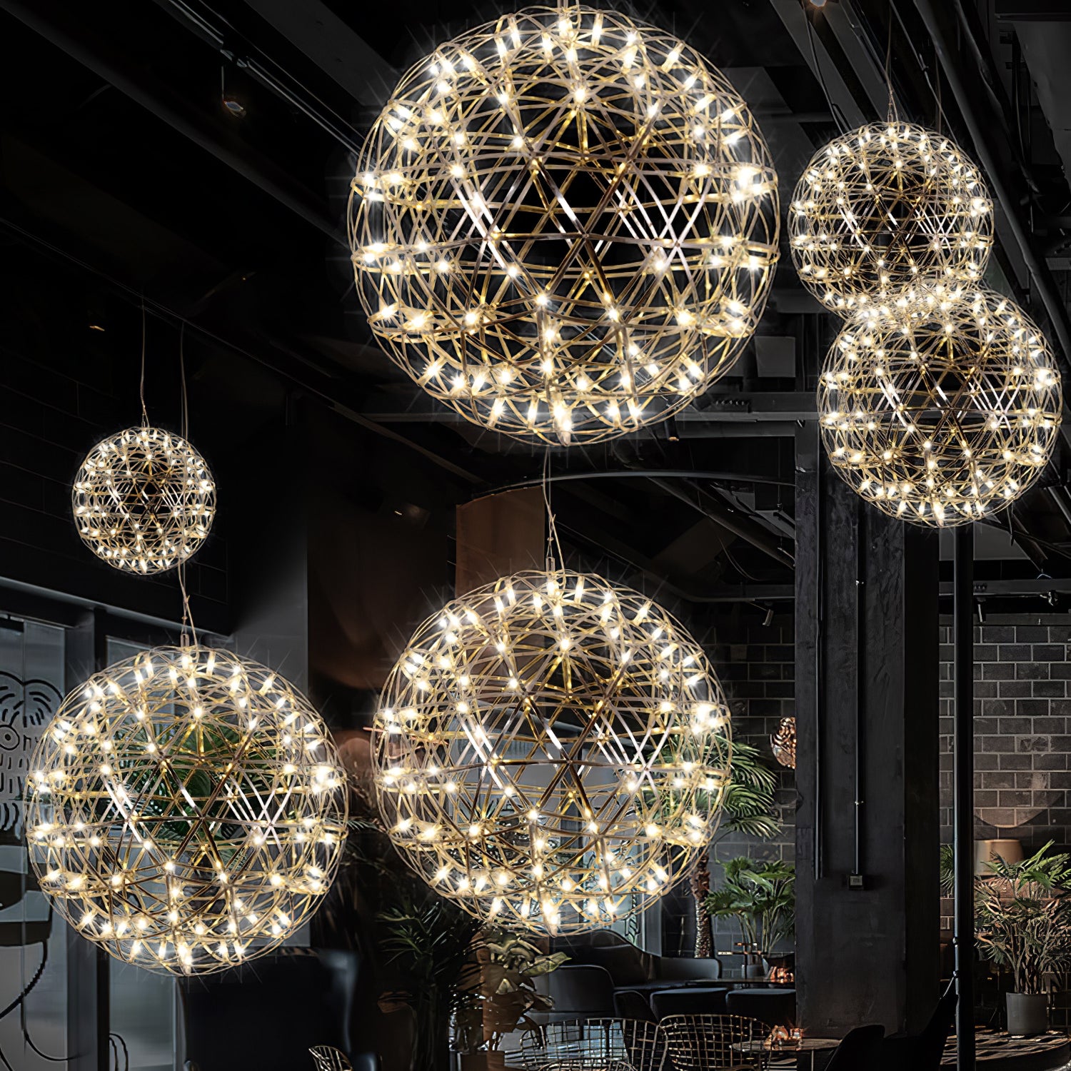 Illuminated lattice spheres above a dark restaurant with exposed beams and climbing greenery