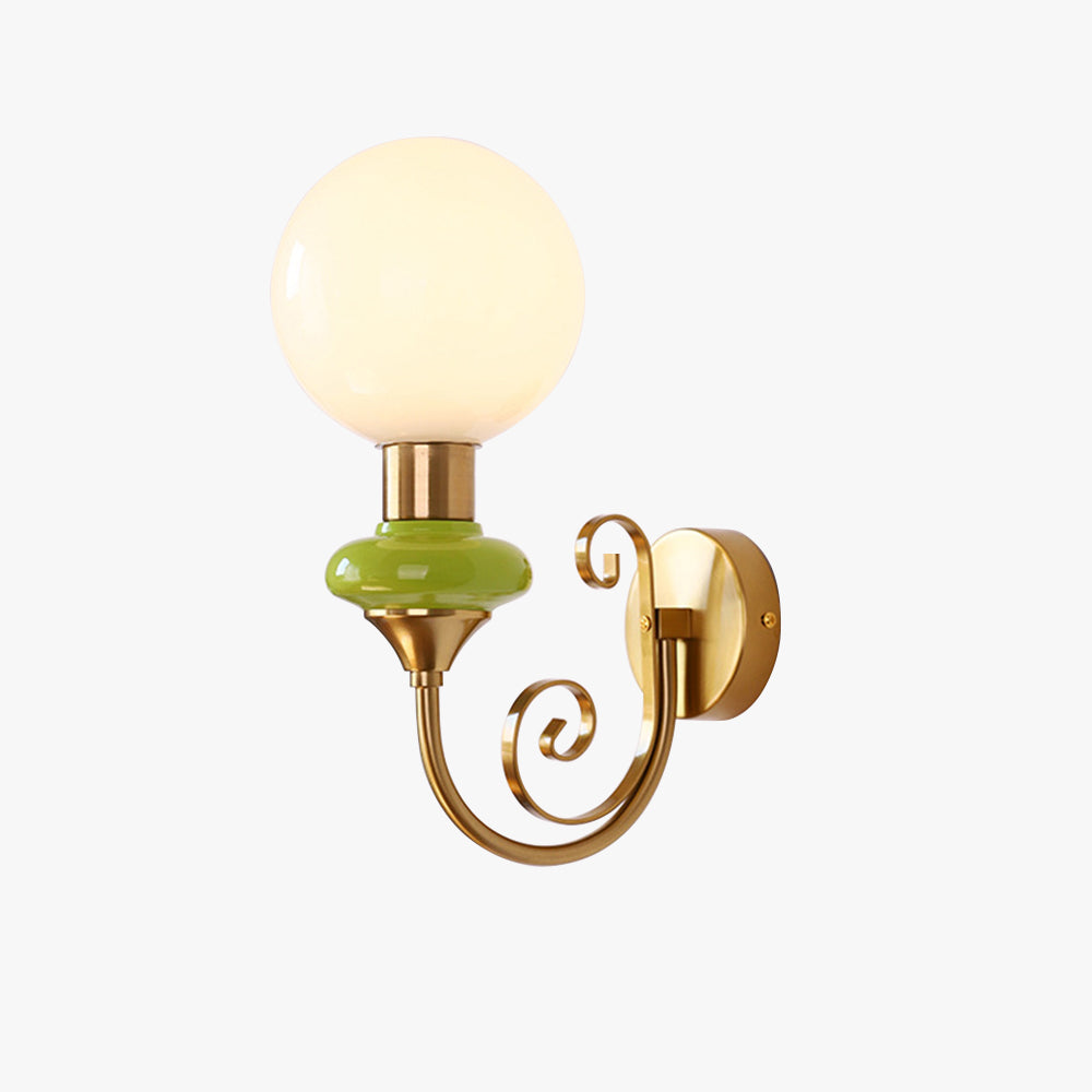 Gold-and-green curled-arm globe sconce isolated