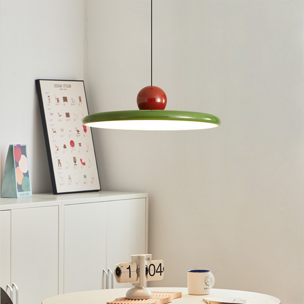 Lola Red and Green disc pendant above a tabletop