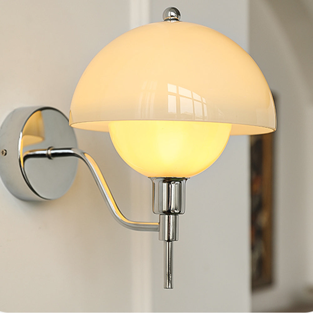 Warm-looking glass mushroom lamp beside a window