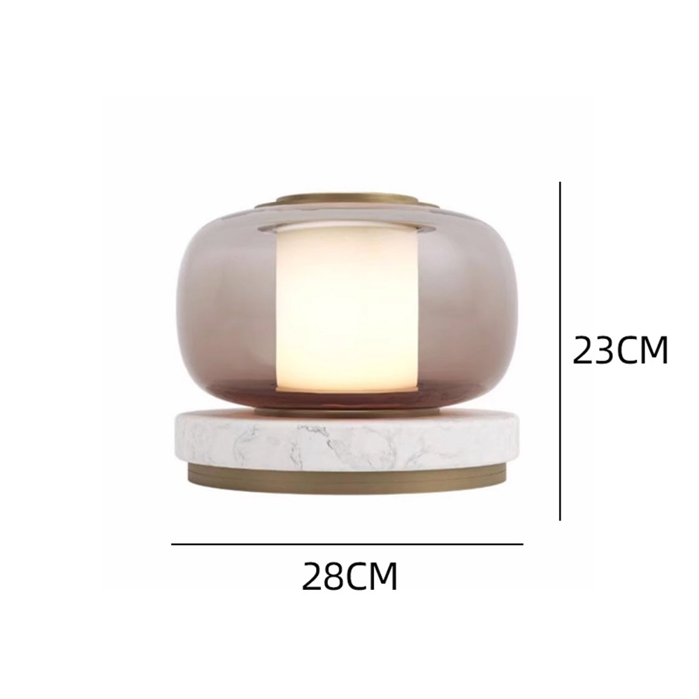 Light-brown glass lamp with a pale base in a dimension diagram labelled 23 cm overall height and 28 cm width