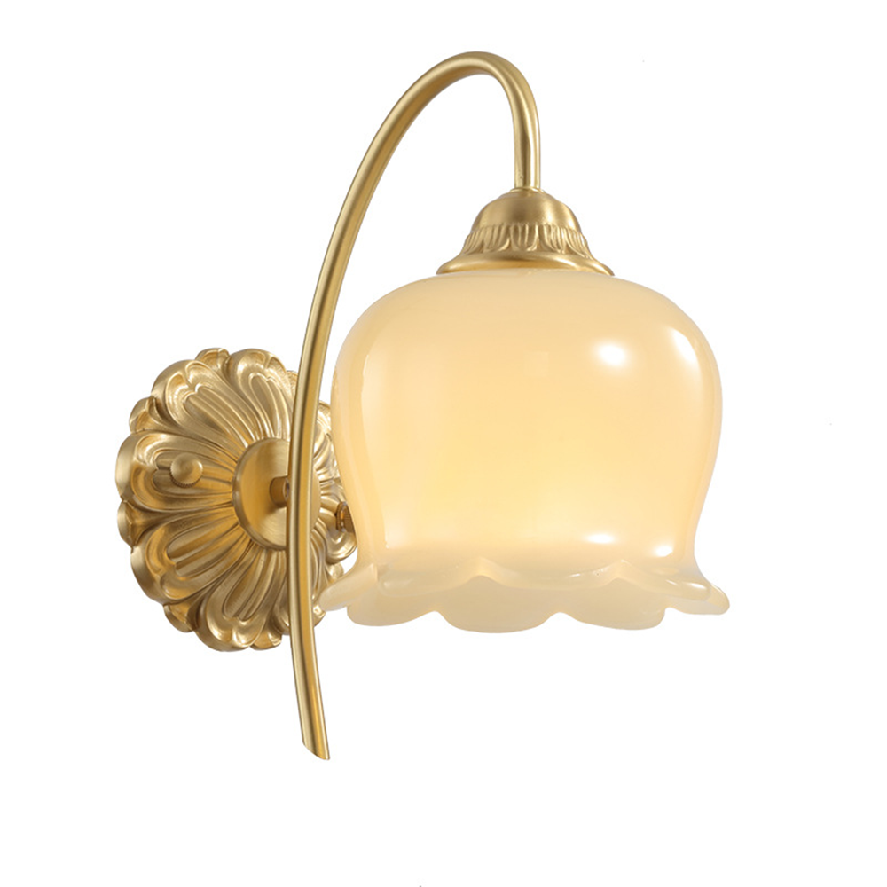 Isolated unlit Style A scalloped glass wall sconce with ornate rosette and gold-tone arched arm