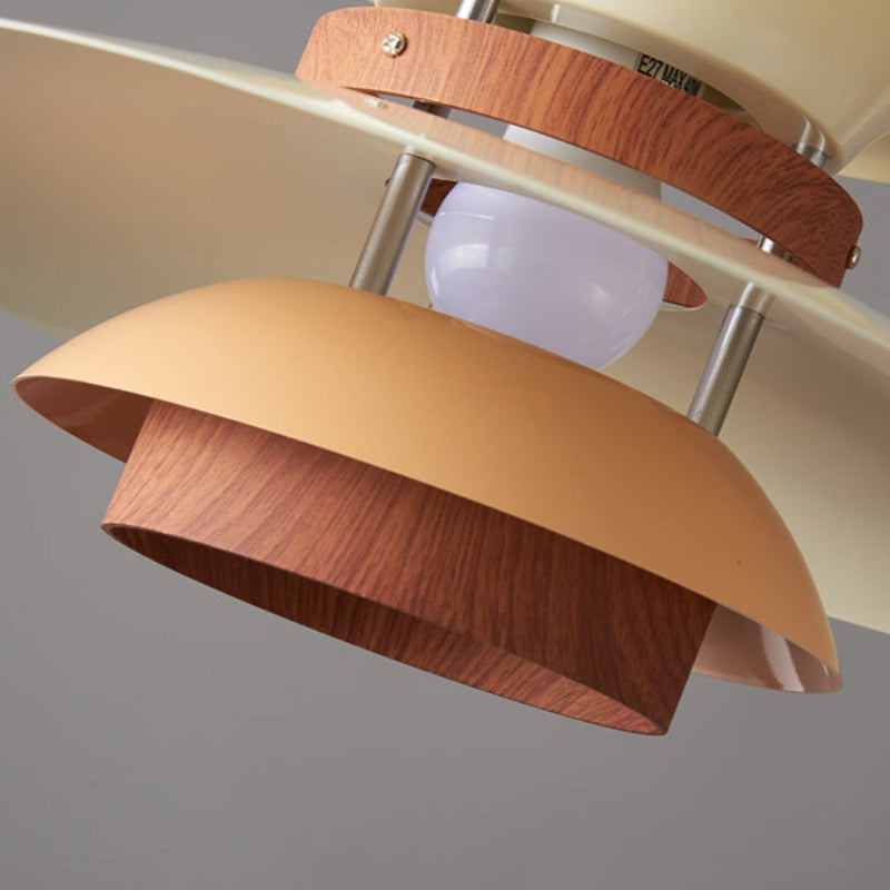 Morandi underside close-up showing bulb, support rods, screws and wood-grain-looking bands between curved shade sections