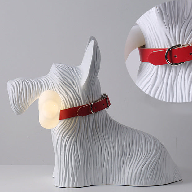 Side view of the white dog lamp with an inset close-up of its red collar buckle and textured fur