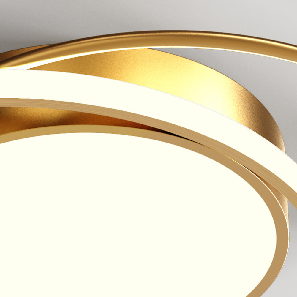 Close luminous ring edge and gold-tone frame around the circular ceiling diffuser