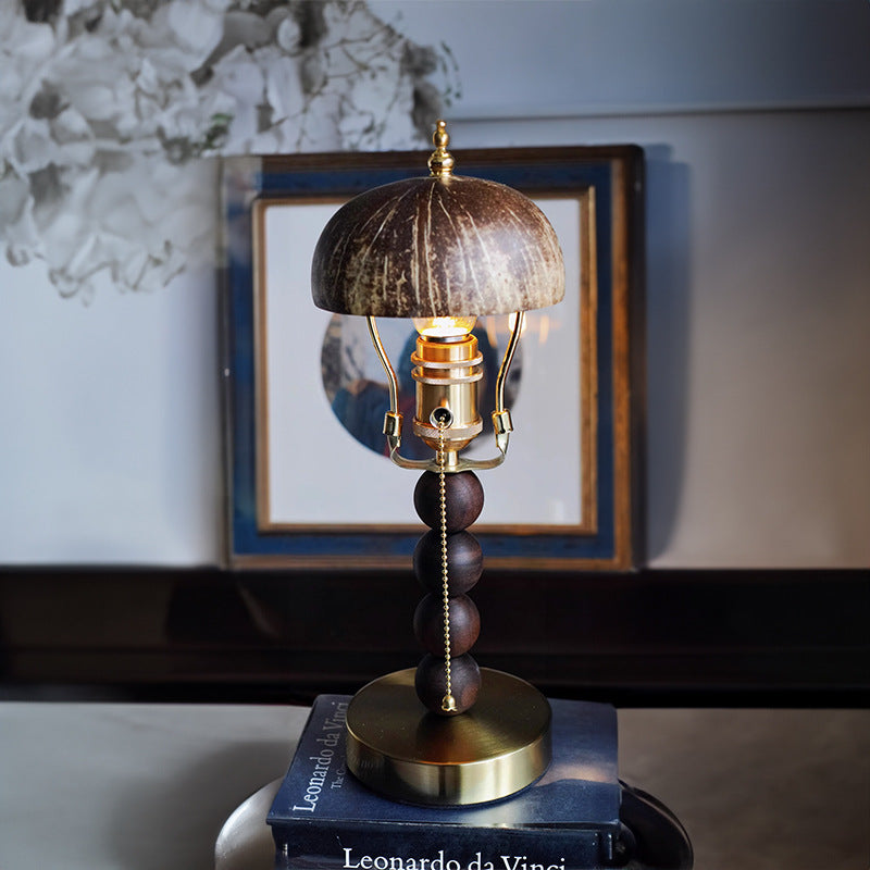 Full view of the brown decorative table lamp and round base