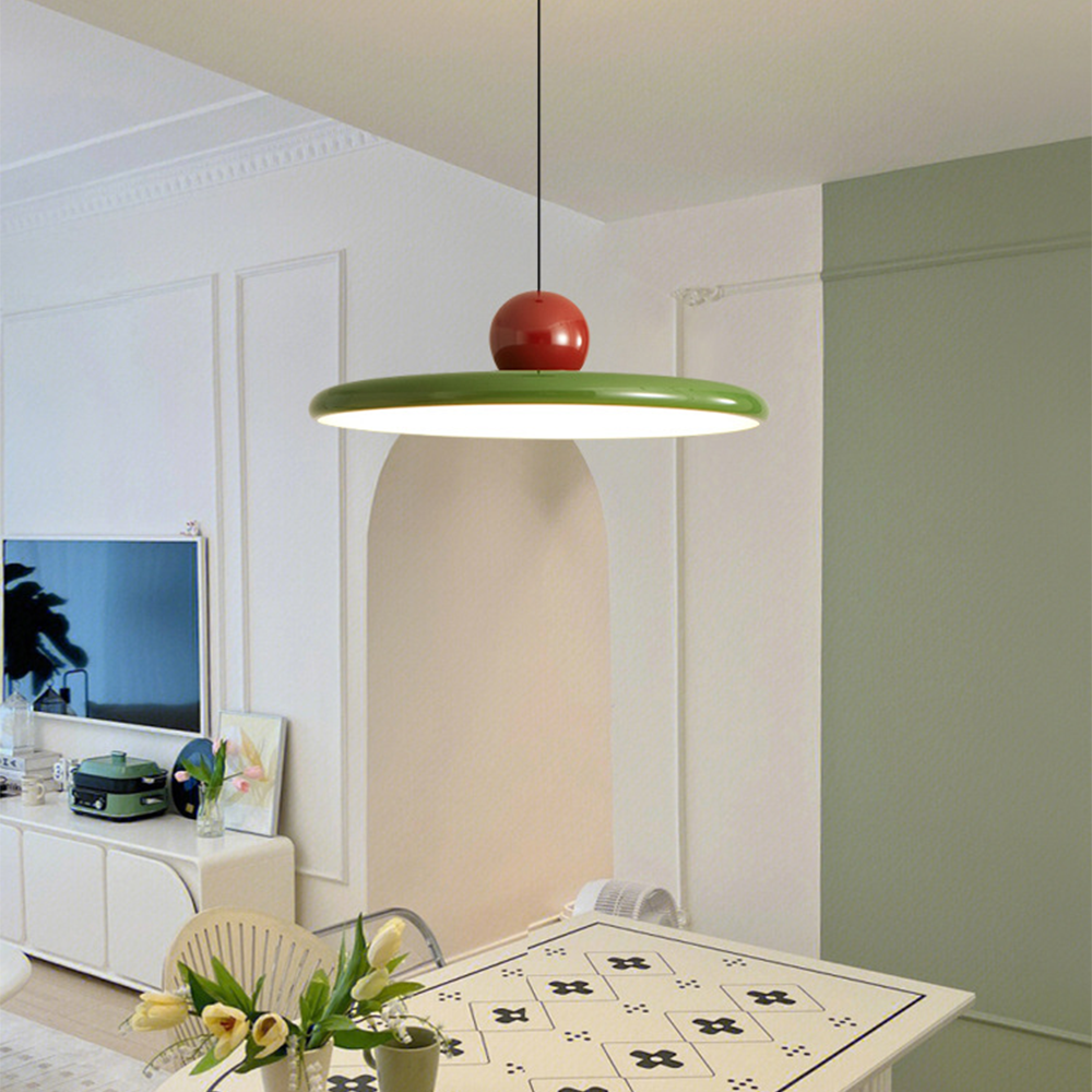 Lola green disc and red sphere pendant in a bright interior