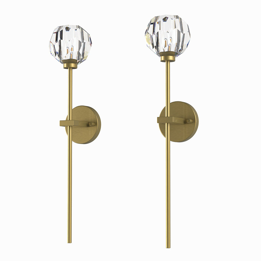 Two isolated views of faceted ball wall light with long gold-tone stem and round plate on white