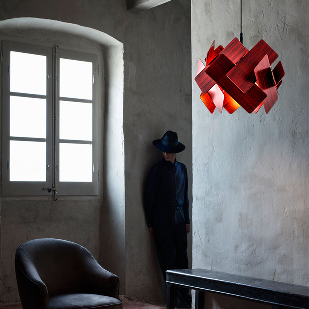 Escape gallery scene with a red geometric pendant